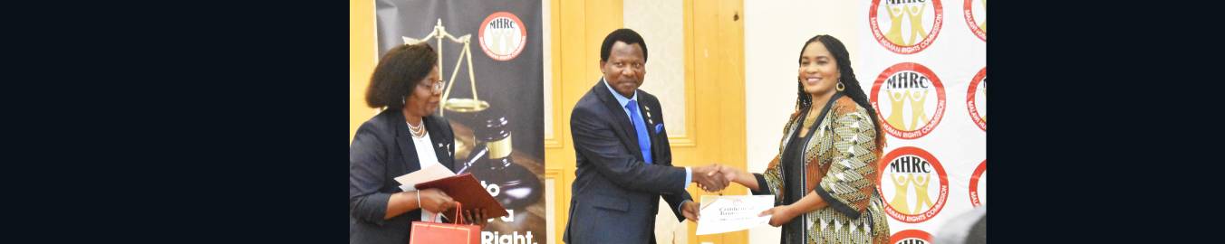 Minister Honours Outgoing MHRC Commissioners